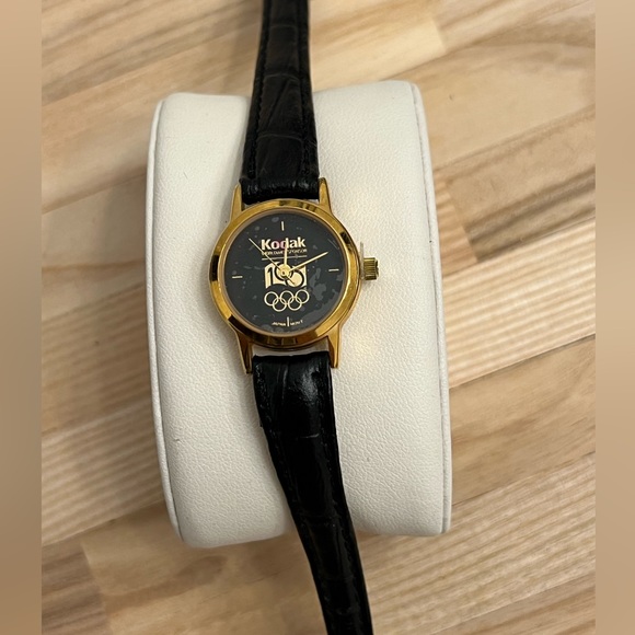 Kodak Olympics Ladies Watch Vintage Genuine Black Leather Yellow Gold Tone Case - Picture 1 of 11